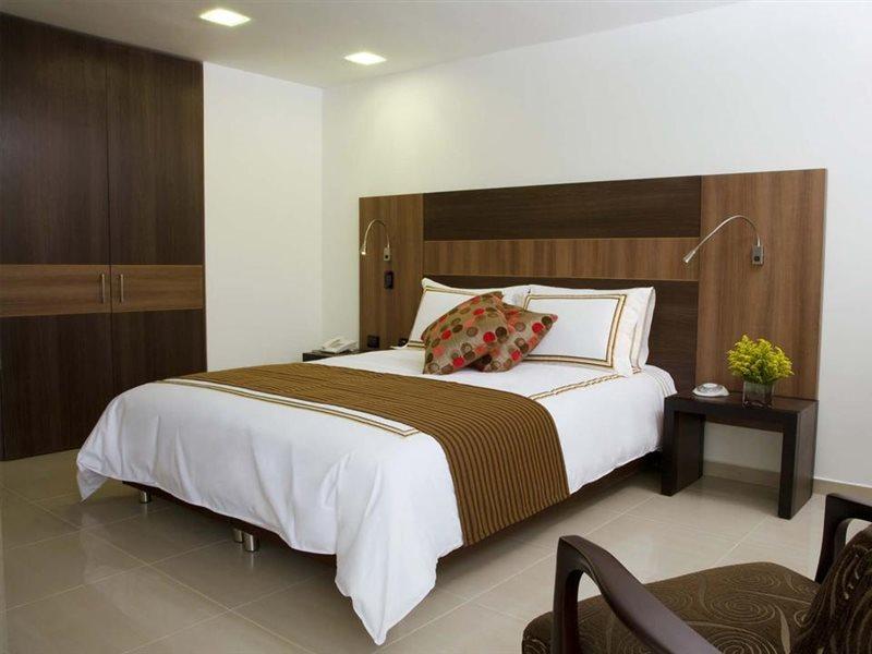 San Simon Hotel Pereira By Soratama 外观 照片 A bedroom