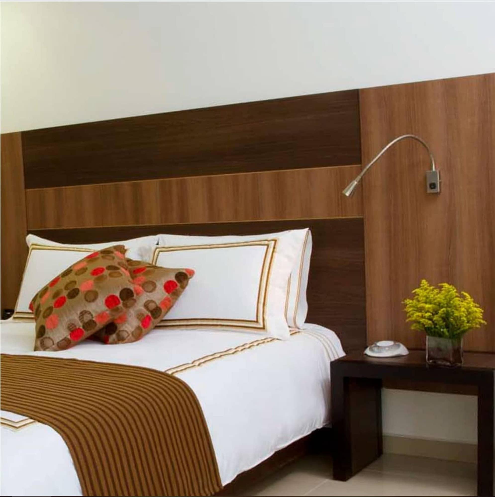 San Simon Hotel Pereira By Soratama 外观 照片 A wall mounted reading light