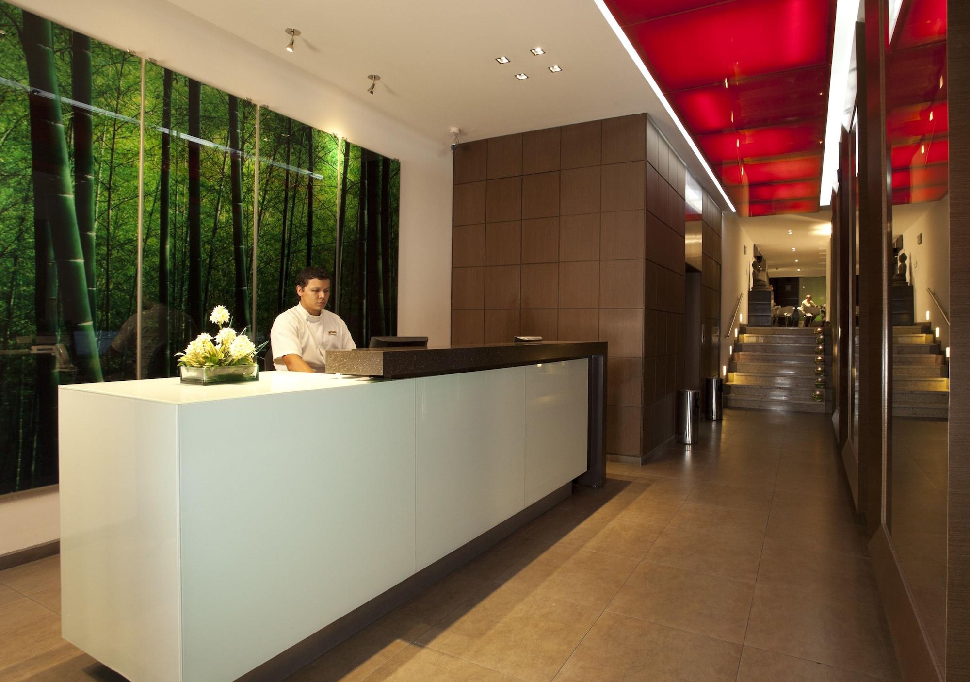 San Simon Hotel Pereira By Soratama 外观 照片 The reception area of the hotel