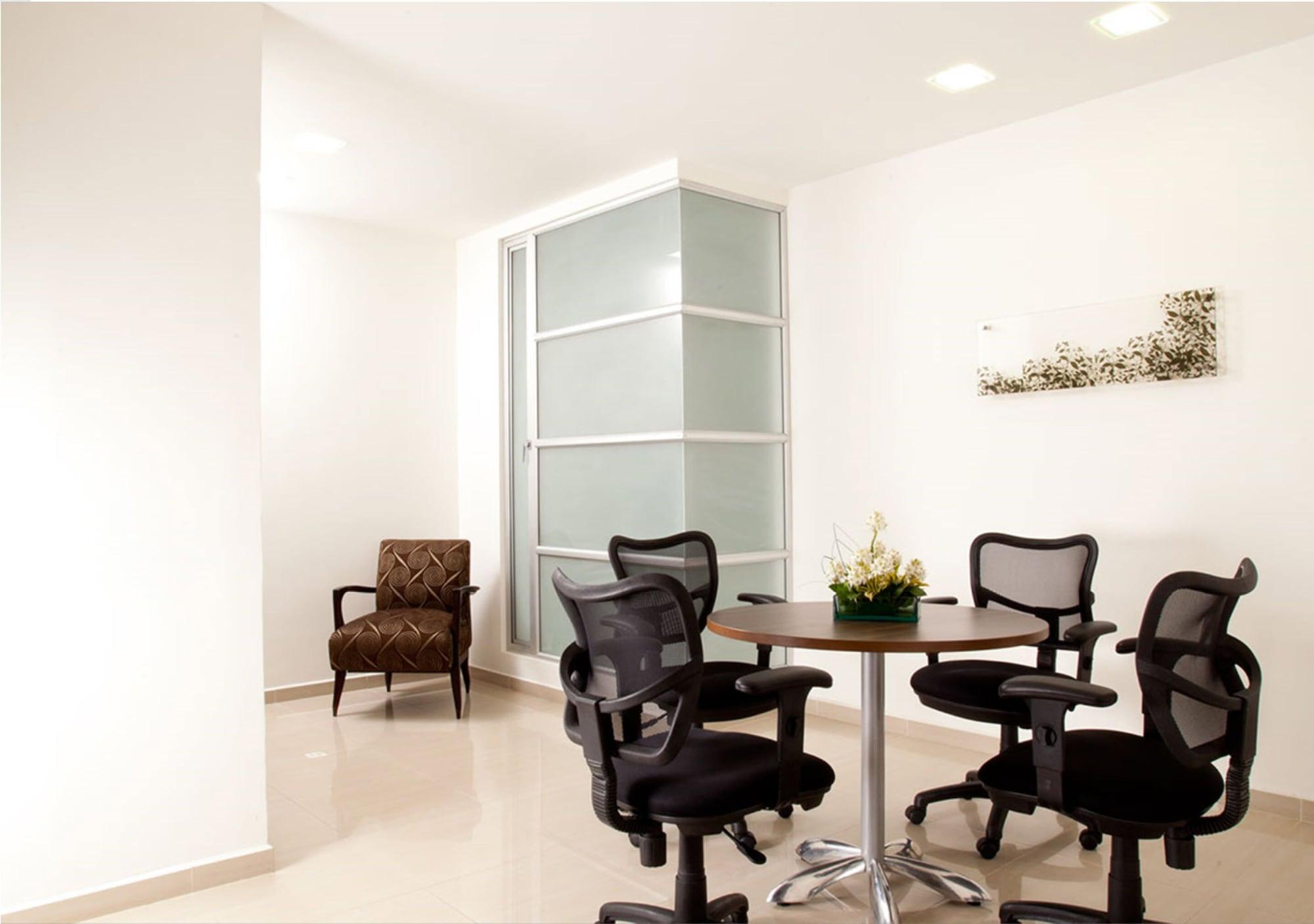 San Simon Hotel Pereira By Soratama 外观 照片 A typical office