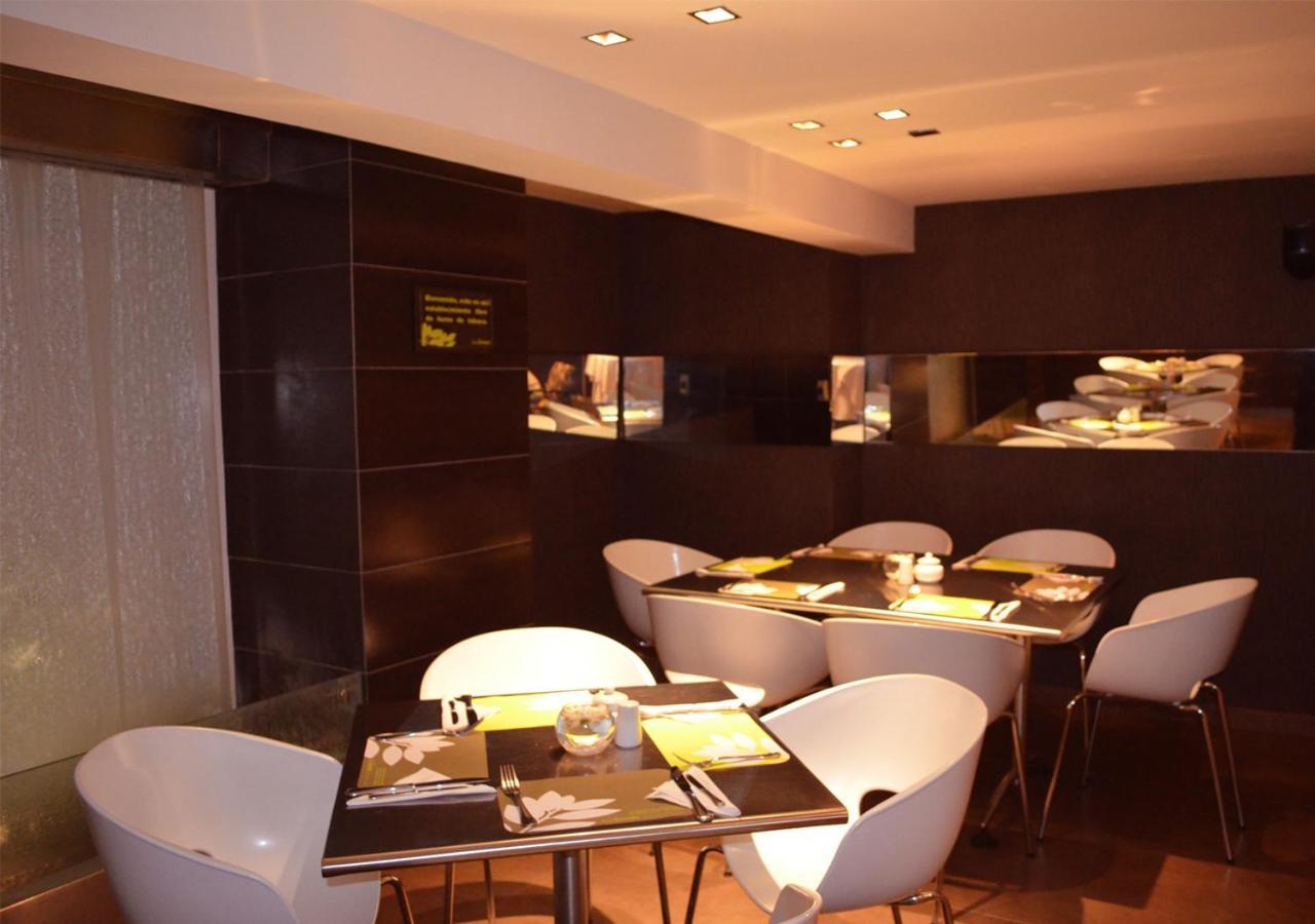 San Simon Hotel Pereira By Soratama 外观 照片 Interior of the restaurant