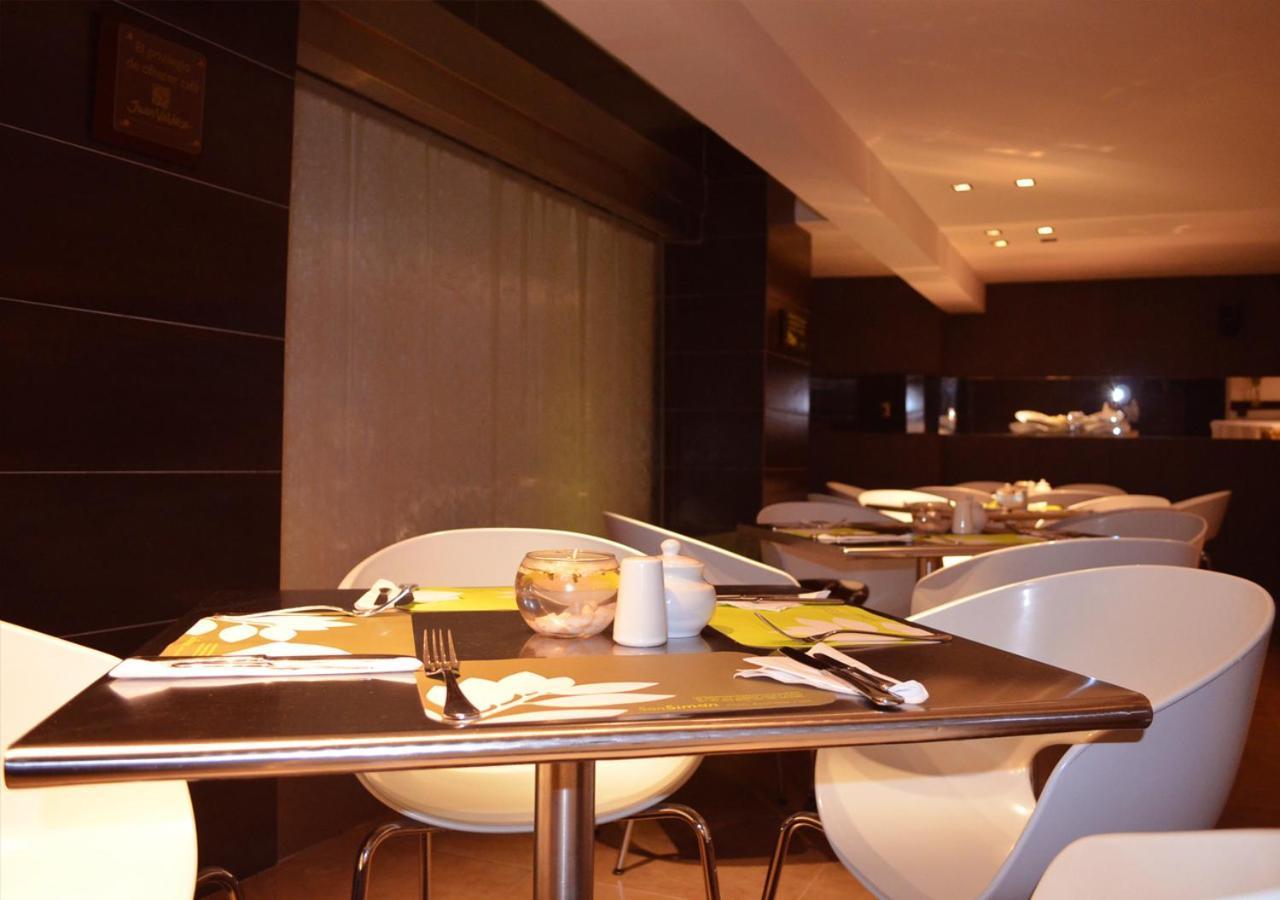 San Simon Hotel Pereira By Soratama 外观 照片 The interior of the restaurant