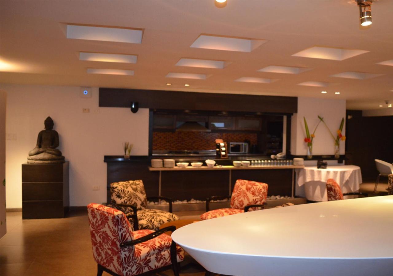 San Simon Hotel Pereira By Soratama 外观 照片 Interior of the restaurant