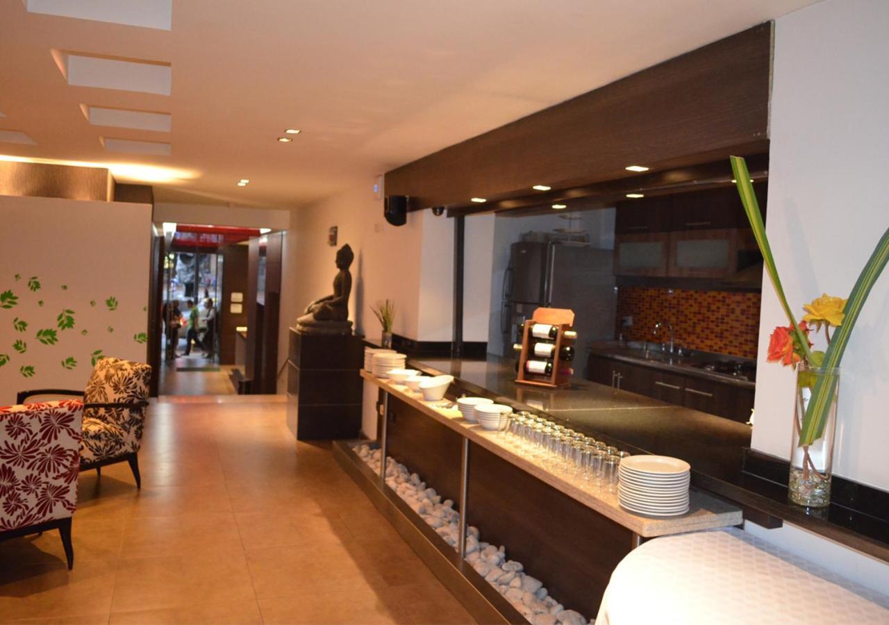 San Simon Hotel Pereira By Soratama 外观 照片 The interior of the restaurant