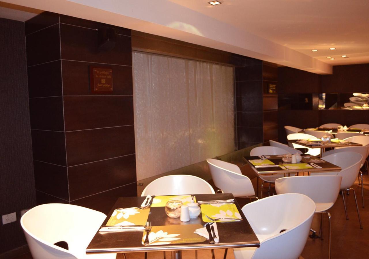 San Simon Hotel Pereira By Soratama 外观 照片 The interior of the restaurant